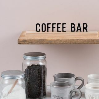 Svart kaffebarskilt