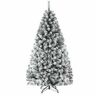 Umetno božično drevo, obsijano s snegom