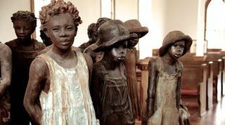 muzeum plantáží whitney, sochy mastí v kostele, otrokářské děti
