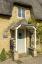 Cottage con tetto in paglia nel villaggio Cotswold di Long Compton in vendita