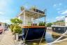 Pārdod pārsteidzošu māju laivu ar skatu uz upi Londonā - pārdod māju