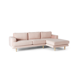 Vaaleanpunainen samettinen tukivarsisekoitettu sohva
