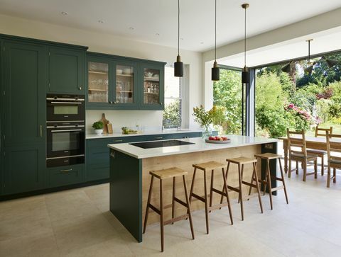 zaļas virtuves dizains, apaļa māja