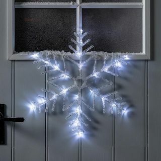 Božična silhueta na prostem iz akrilne snežinke