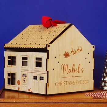 Casa de madeira personalizada para véspera de Natal
