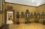 Burlap sienas ir ideāli piemērotas mākslas kolekcijai