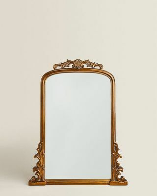 مرآة خشبية ذهبية